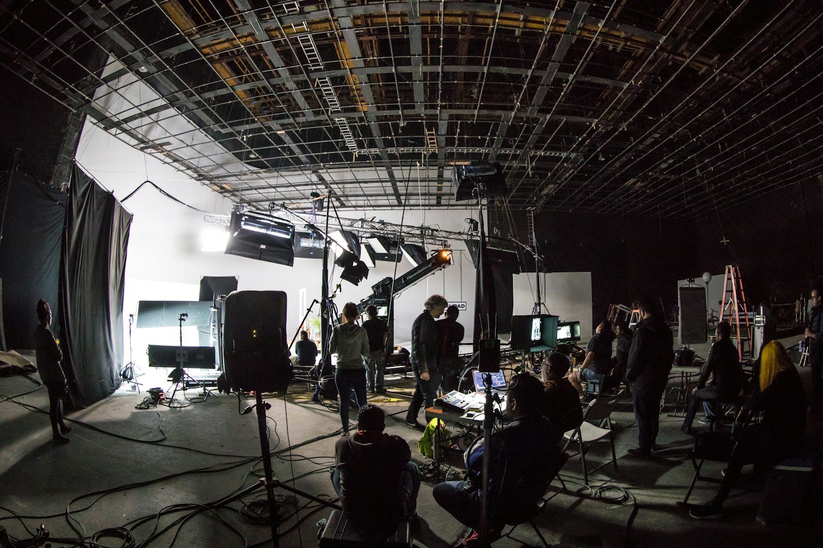 Film crew on a lit soundstage during a brand film shoot – creative agency in Delhi