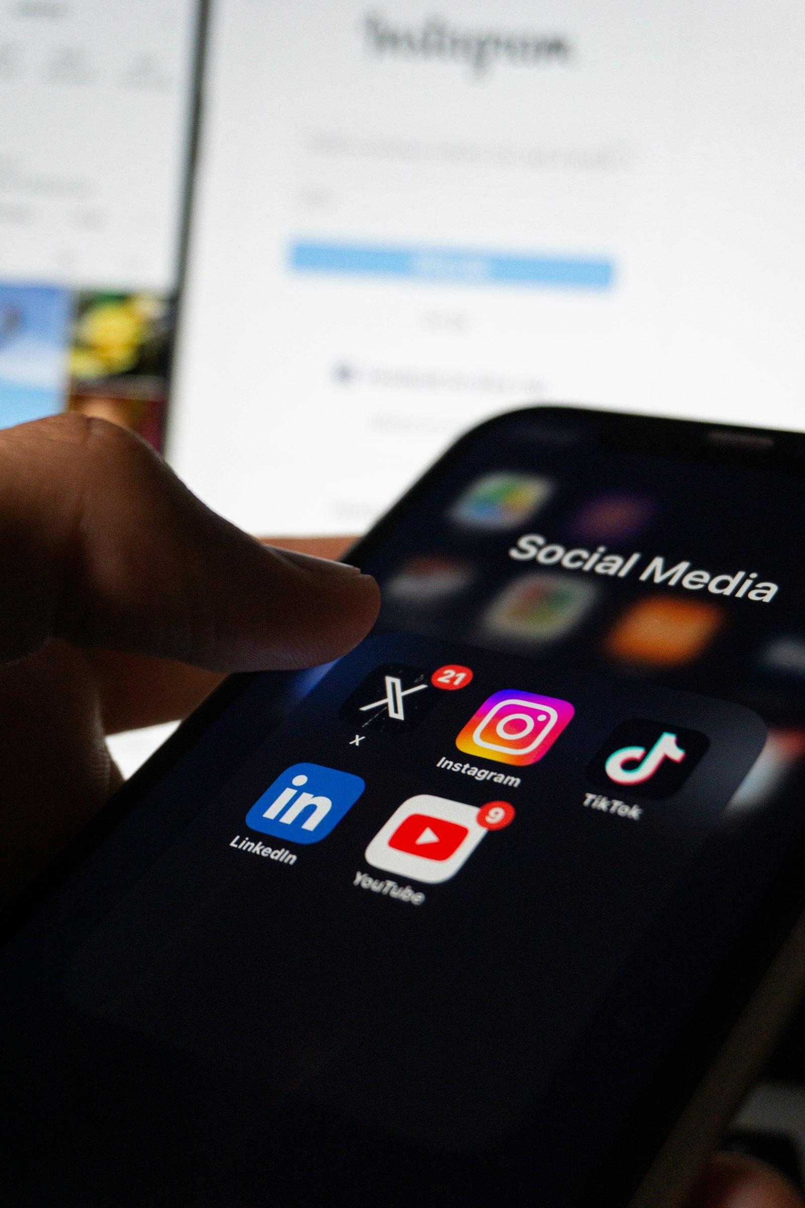 Phone showing a social media feed – creative agency in Delhi